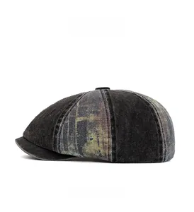 Side view of washed denim beret featuring vintage distressed texture and clean stitching
