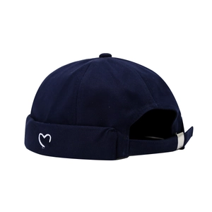 Navy blue cotton docker cap with white heart embroidery and adjustable metal buckle
