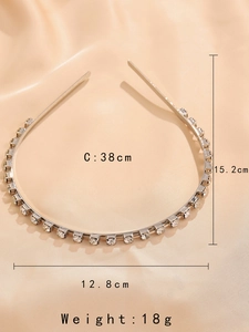 Detailed dimensions of silver headband with square clear zircons on silk background