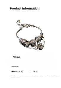 Detailed view of silver heart hollow doll bracelet with rhinestones and 23.7cm length