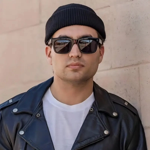 Men's stylish square sunglasses with arrow detail, black beanie and leather jacket
