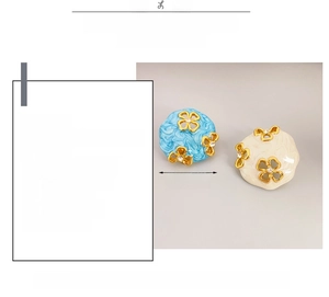 Detail view of vintage enamel flower earrings featuring S925 silver pins and 18K gold plating