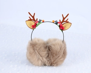 Detail of Christmas reindeer ear muffs in brown faux fur with plush antlers and deer ears