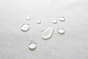 Macro shot of water droplets on waterproof textured geometric embroidery tablecloth