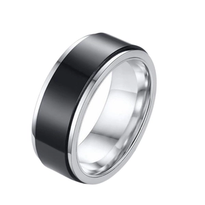 Polished silver and black spinner ring in titanium steel with a minimalist rotatable design