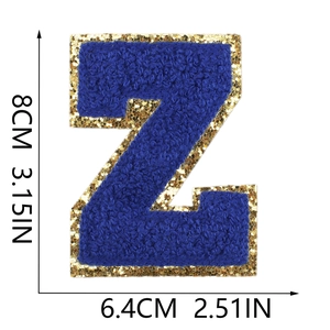 Detail of 8cm letter Z chenille embroidery patch in royal blue with gold glitter border