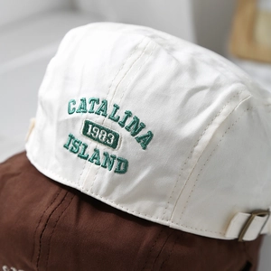 Beige and brown 1983 embroidered beret hats with vintage adjustable metal buckle