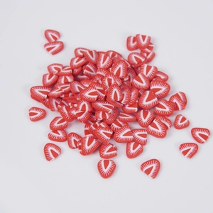 Vibrant strawberry polymer clay slices for DIY crafts and nail art decoration