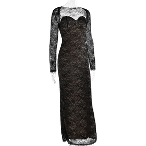 Close-up of black lace long-sleeved dress with sheer texture on a display mannequin