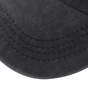 Close-up of the black washed cotton baseball cap brim with triple-row parallel stitching