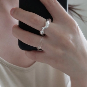 Irregular liquid silver 925 sterling silver ring with minimalist wavy lava texture
