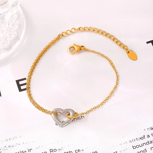 Minimalist 18k gold plated stainless steel bracelet with hollow silver heart charm
