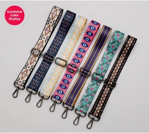 Detail of adjustable ethnic style bag straps with gun-metal hardware in various patterns