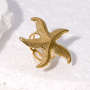 Minimalist gold starfish open ring in stainless steel with textured sea star design