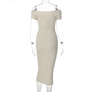 Detail view of beige ribbed knit off-shoulder dress with a slim fit mid-calf back cut