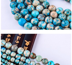 Macro shot of blue and brown marble textured round imperial stone beads for DIY jewelry