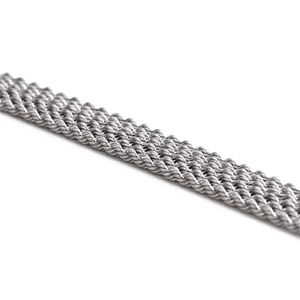 Macro shot of silver stainless steel flat woven chain showing metallic texture details