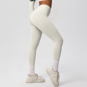 Close-up of cream high-waisted yoga leggings with seamless sculpting and butt-lifting design