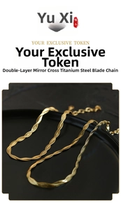 Detail view of 18K gold double layered mirror cross snake bone chain necklace in titanium steel