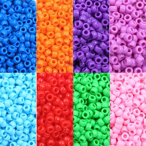 Macro shot of colorful acrylic pony beads with large holes for DIY jewelry making