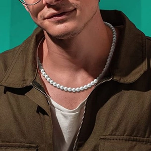 Minimalist white ABS pearl necklace for men shown on neck with a modern fashion aesthetic