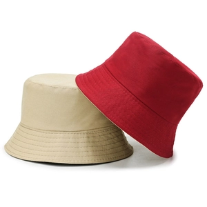 Classic double-sided cotton bucket hats in beige and red with durable stitched brims