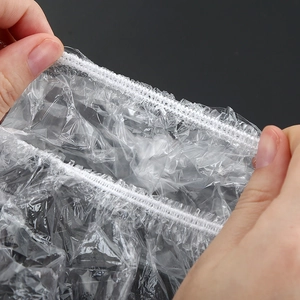 Close-up of durable elastic band on transparent food-grade plastic storage covers