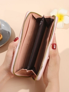 Elegant pink long wallet for women with multiple card slots and zipper closure