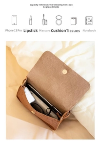 Detailed interior of brown Snoopy crossbody bag showing capacity for phone and cosmetics