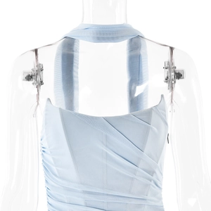 Close-up of light blue halter neck dress featuring pleated mesh fabric and slim fit design