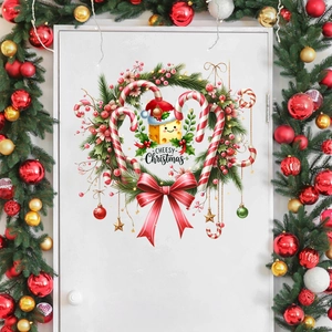 Détail d'un autocollant de porte avec couronne de Noël, fromage mignon et nœud rouge