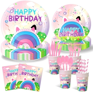 Gabby's Dollhouse themed birthday party set with pink plates, napkins, and cups