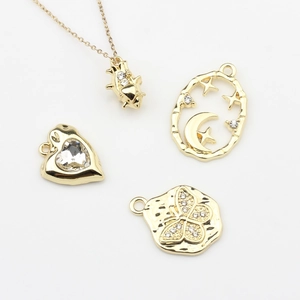 Golden alloy DIY jewelry charms set featuring heart, butterfly, moon and star designs