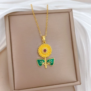 Luxurious gold titanium sunflower necklace with enamel petals and sparkling crystals