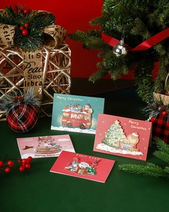 Detailed view of 3D pop-up Christmas cards with colorful cartoon festive patterns