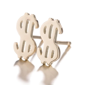 Macro shot of gold dollar sign stud earrings with high-polish finish on reflective surface