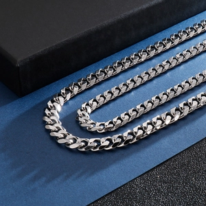 Polished silver stainless steel Cuban link chain necklace for men on a premium gift box