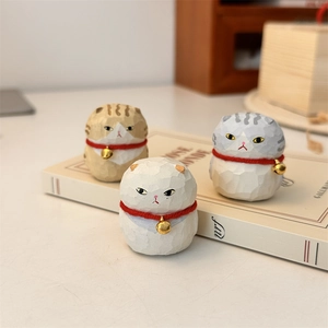 Set of 3 handcrafted wood carved cartoon cat figurines with golden bells on books