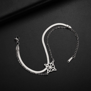 Macro shot of silver stainless steel double layer bracelet with snake chain and S.Steel mark