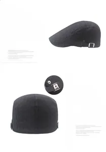 Détail de la boucle métallique réglable sur le béret en coton rayé gris foncé