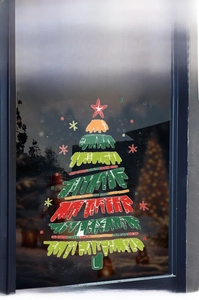 Detail of colorful Christmas tree window decal with star and snowflake patterns