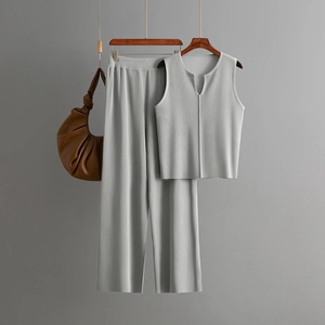 Close-up of light gray ribbed knit sleeveless top and wide-leg pants two-piece set