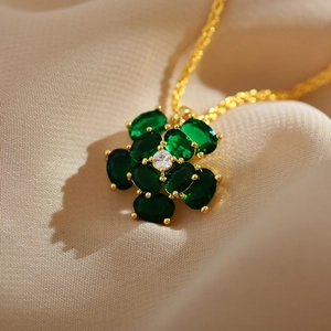 Elegant gold-plated flower necklace with natural malachite green petals and crystal core