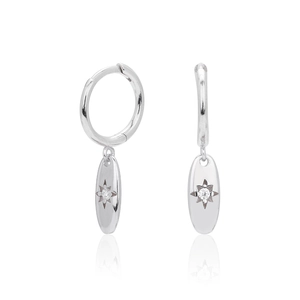 Detail view showing silver S925 octagonal hoop earrings with engraved star and zircon stones
