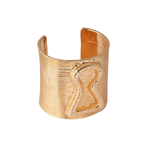 Golden wide open bangle with linear texture and hourglass design on white background