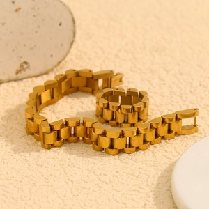 Polished 18K gold plated stainless steel watch-style chain ring and bracelet set details