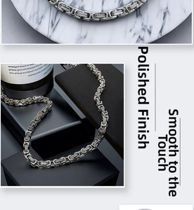 Detail of silver Byzantine chain necklace showing intricate polished steel links
