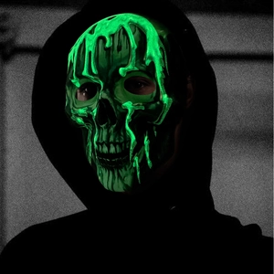 Luminous Halloween skull mask with glowing green liquid texture for spooky cosplay parties