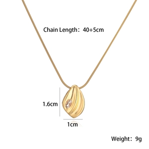 Detailed view of irregular geometric gold pendant with zircon and 40+5cm chain size