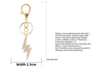 Detailed view of gold lightning bolt keychain with size labels and sparkling rhinestones